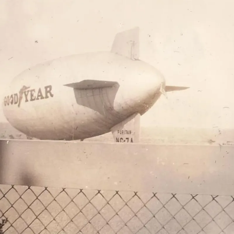 A Goodyear-branded blimp above the 1933 Chicago World’s Fair
